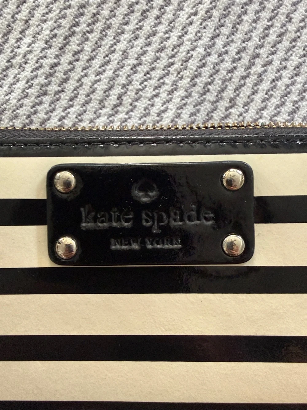 kate spade Black and White Striped Patent Zip Wallet